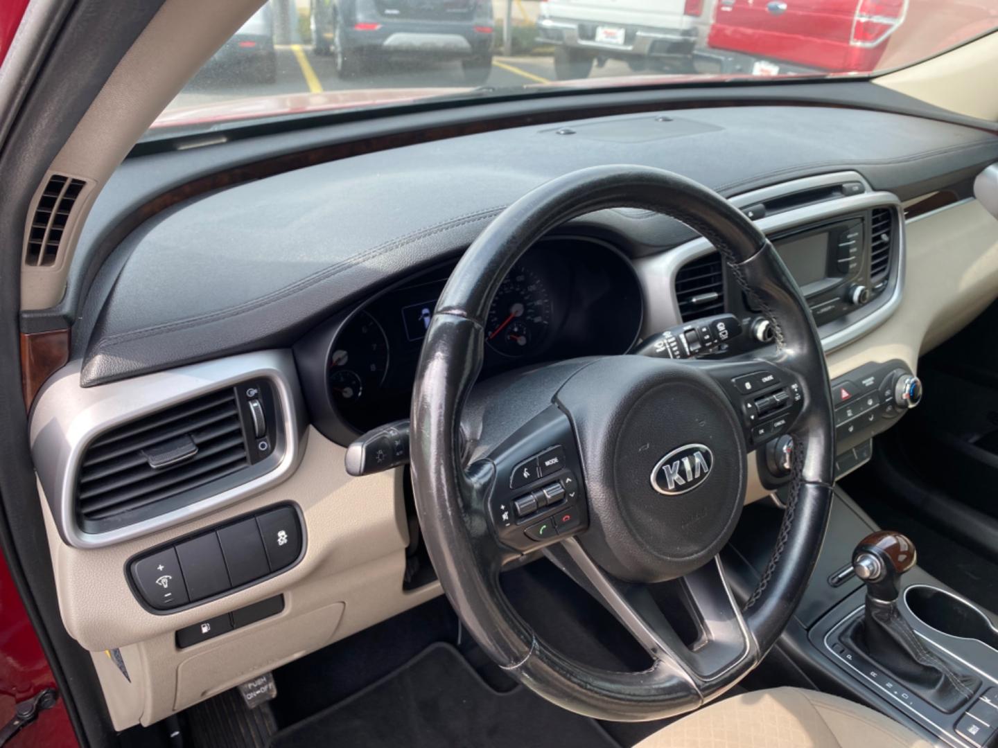 2016 RED Kia Sorento LX 2WD (5XYPG4A32GG) with an 2.4L L4 DOHC 16V engine, 6-Speed Automatic transmission, located at 420 I-35E, Lancaster, TX, 75146, (469) 297-4144, 32.593929, -96.823685 - Photo#3